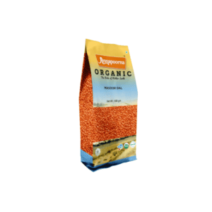 Packaged product of Annapoorna brand's Organic Masoor Whole (red lentils), with a clear window showing the lentils inside, suggesting an organic and natural quality of the product.